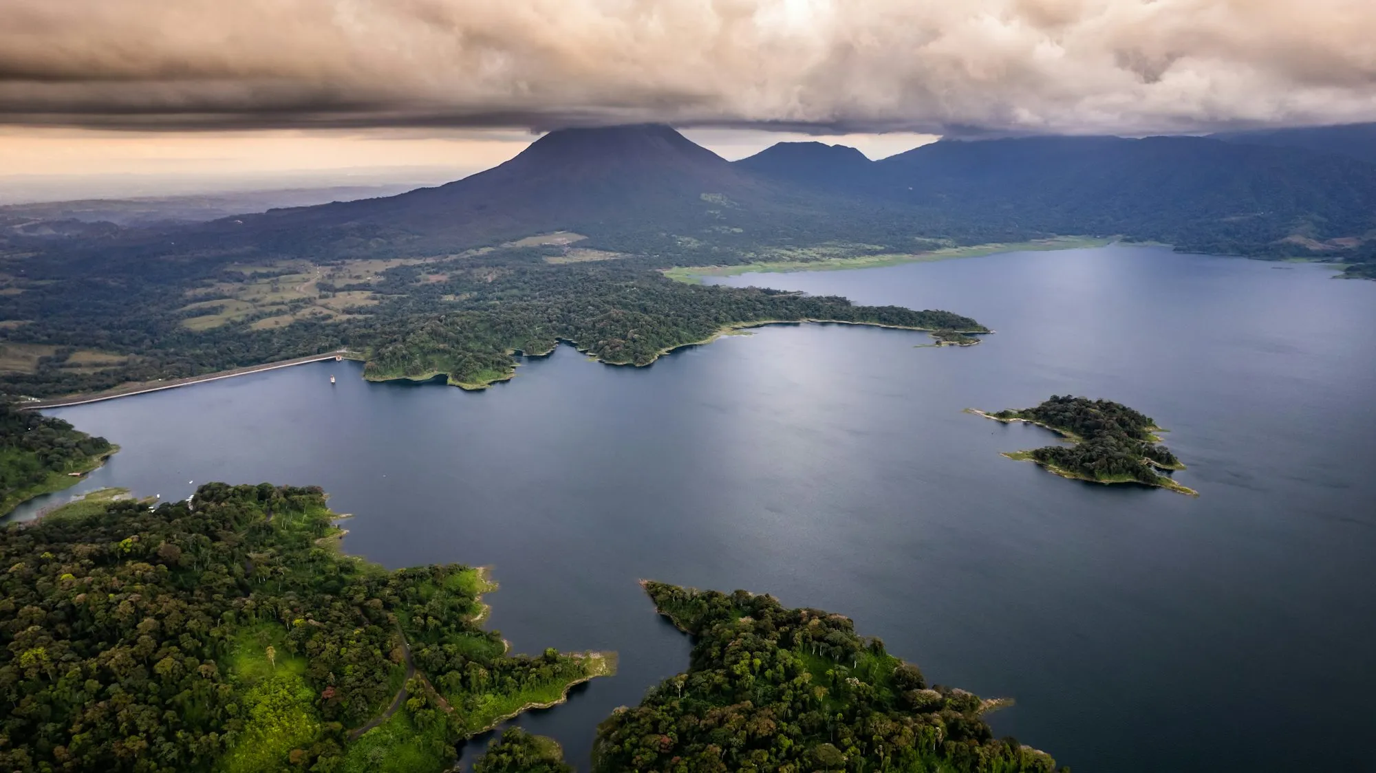 Arenal Volcano reflected in the lake - the conical perfection that defines Costa Rica
