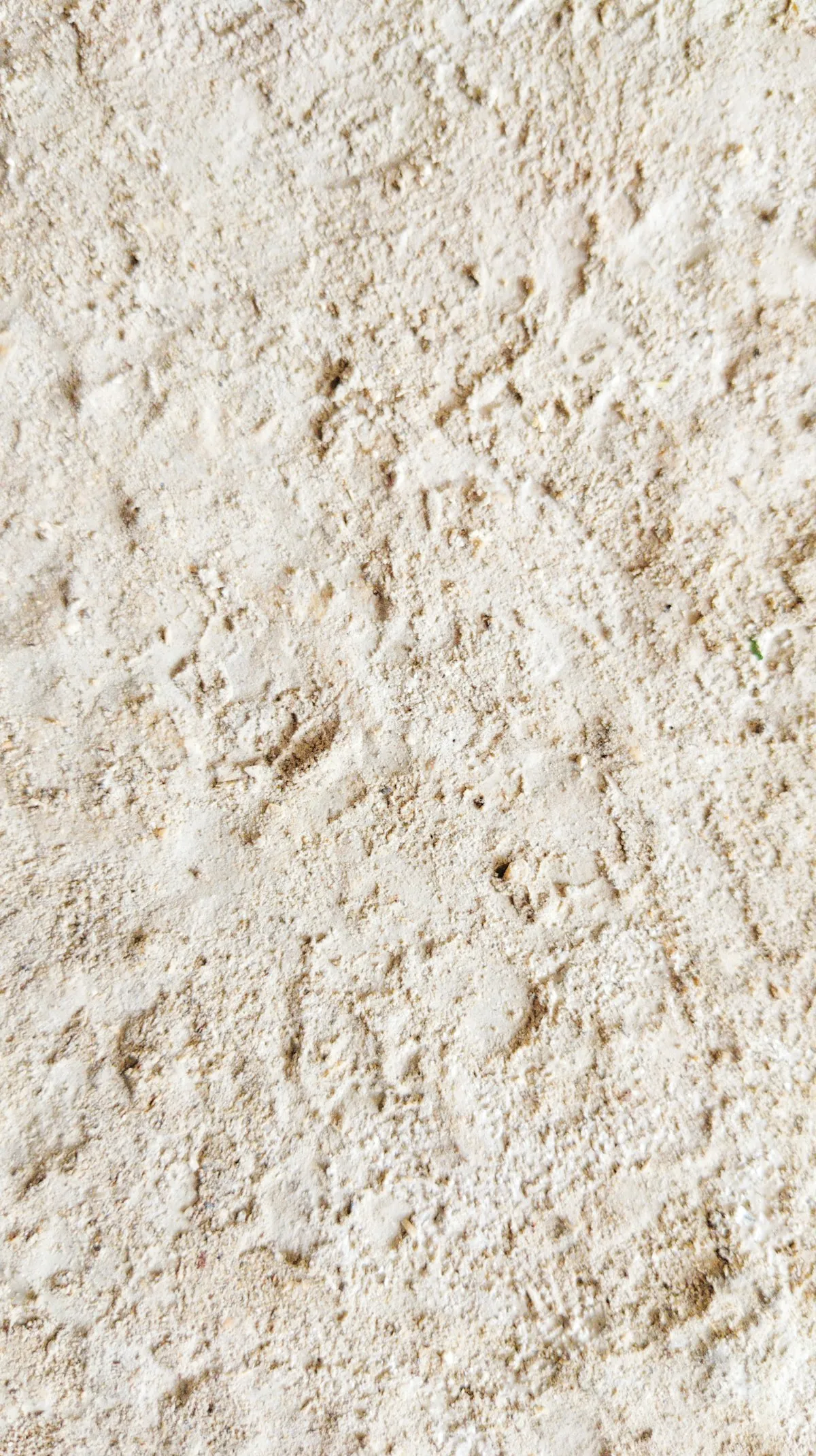 Travertine stone wall texture with warm brown undertones