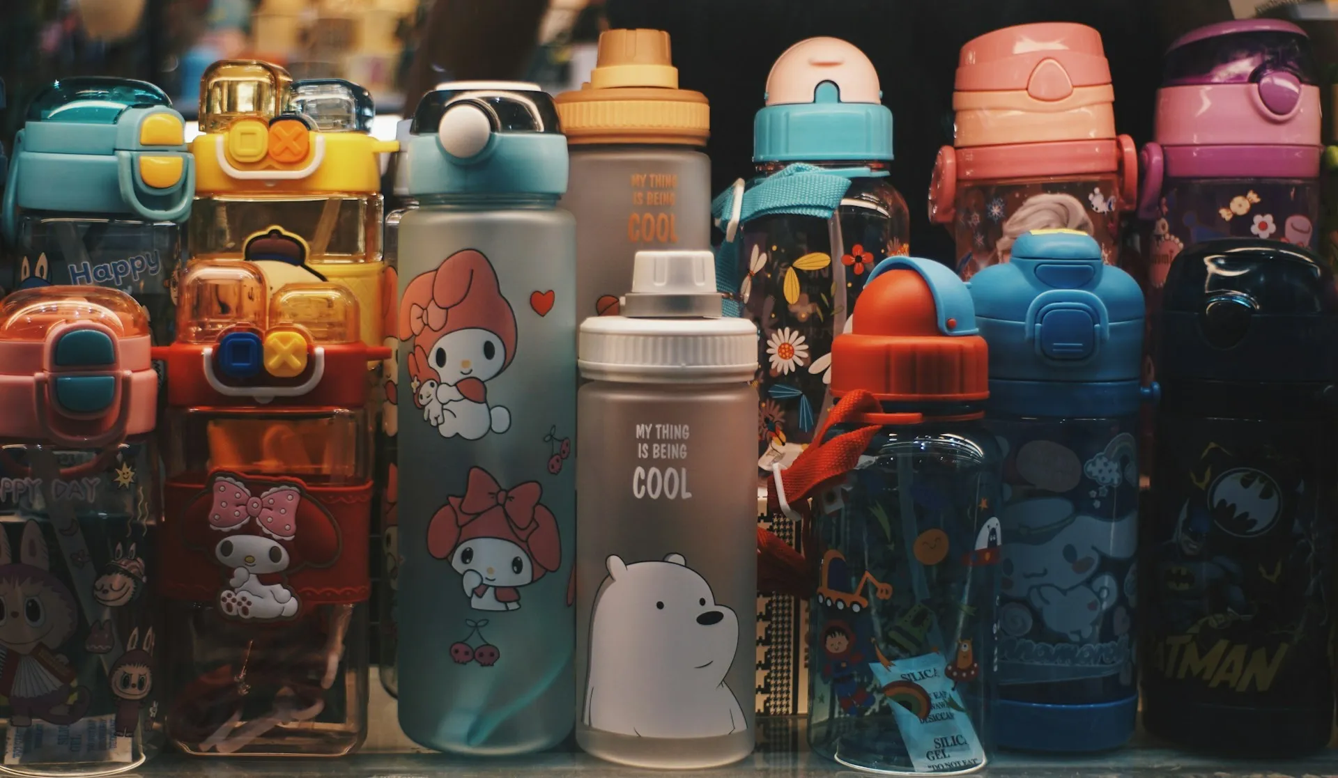 Multiple water bottle colors arranged in a collection