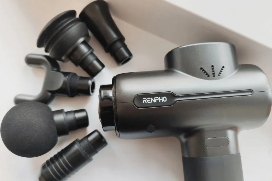 Percussion massage gun with five attachment heads