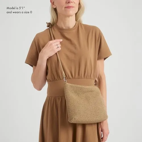 The Sak Lumi — worn as a crossbody, showing scale
