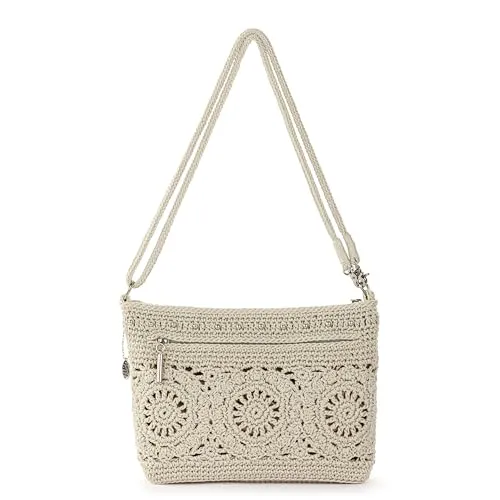 The Sak Lumi — worn as a clutch, showing versatility