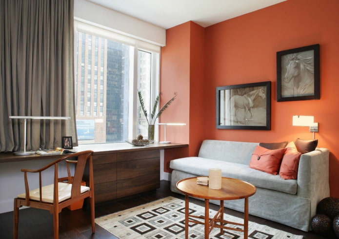 Terracotta accent wall in a dining space